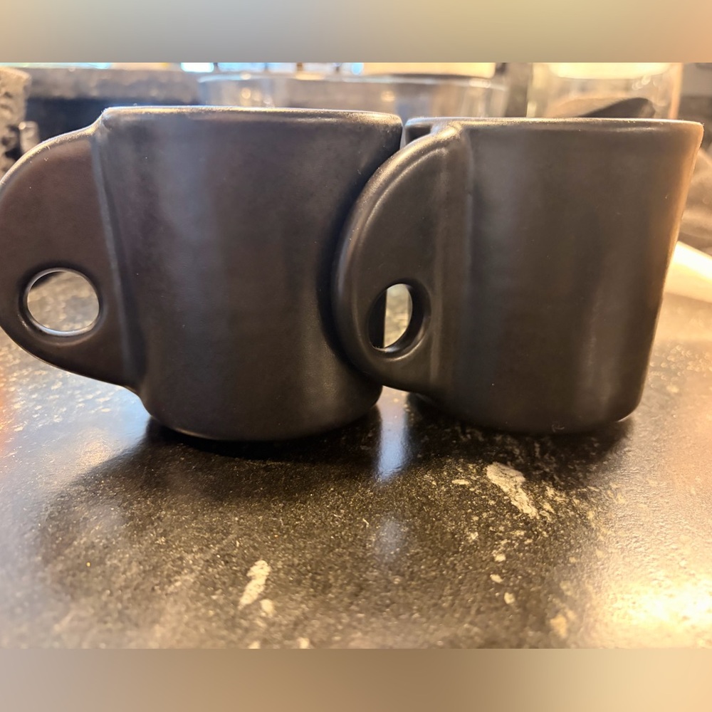 Black H&M Ceramic Mugs with Unique Handle Design